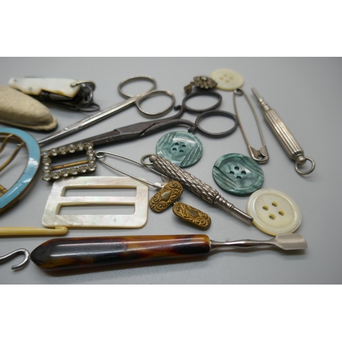 963 - Assorted items including a novelty cheroot cutter, buckle, scissors, mother of pearl handled pocket ... 