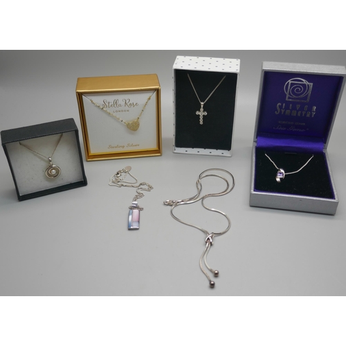 982 - Six silver necklaces and pendants, boxed