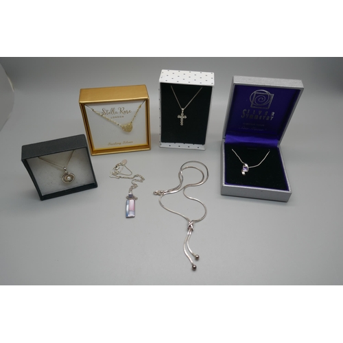 982 - Six silver necklaces and pendants, boxed