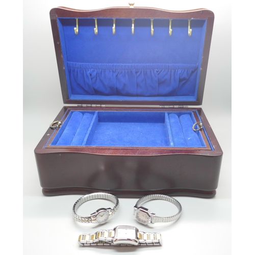 985 - Three lady's wristwatches; Rotary and two Sekonda and a wooden two layer jewellery box