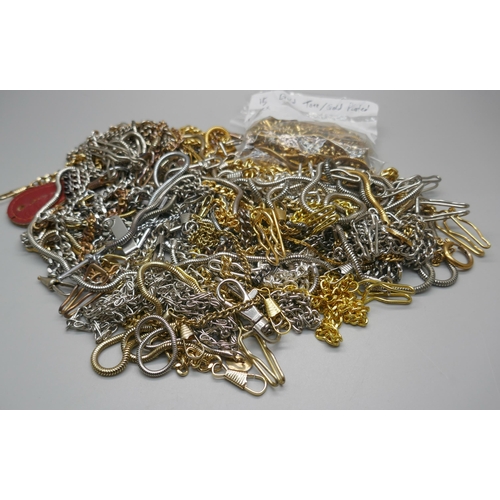 986 - A collection of modern Albert chains including gold tone