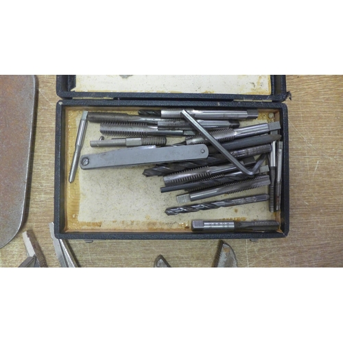 2010 - A tap and die set with assorted clamps and grips