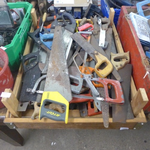 2025 - A box of various saws, all different types and sizes
