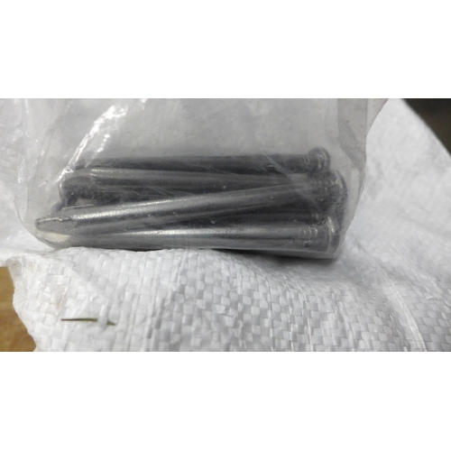 2052 - A quantity of oval brad head nails, eye screw bolts and galvanised half round gutter support bracket... 