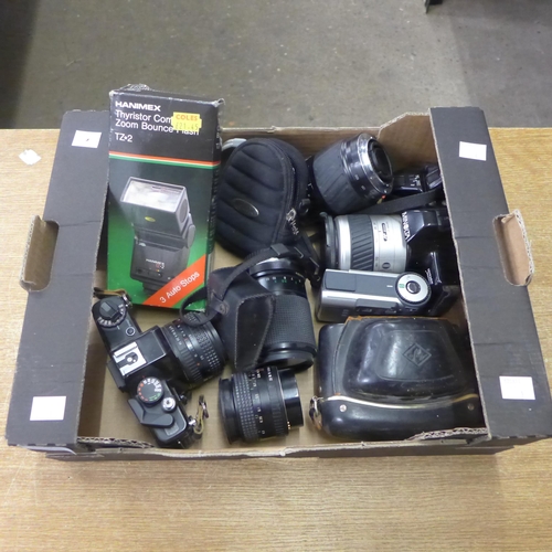 2070 - A box of 35mm cameras and 4 lenses with 2 digital cameras