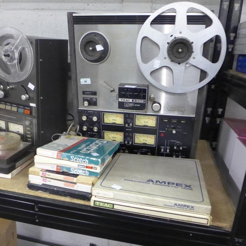 2079 - A Teac A-3340 Studio reel to reel recorder with 8 reels