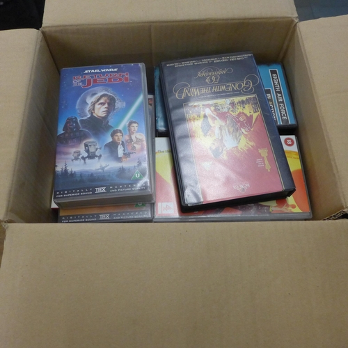 2083 - A box of various VHS videos including Star Wars trilogy