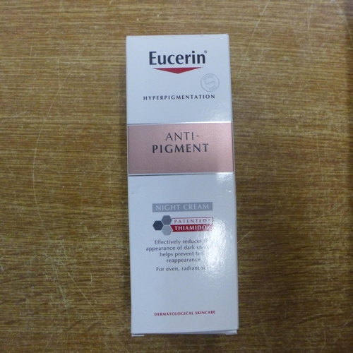 2090 - A box of 12 Eucerin Anti-Pigment cream - box opened by sale room staff - unused