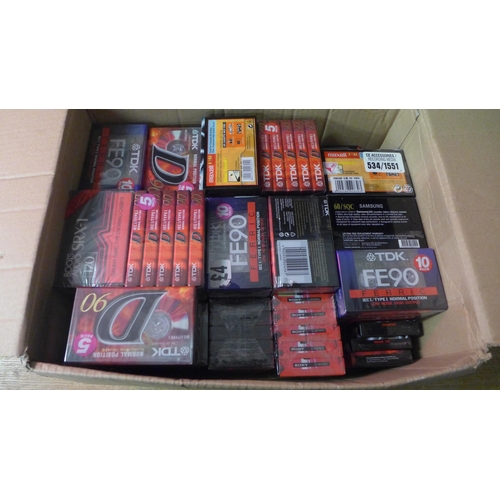 2129 - A box of blank tapes, mostly TDK