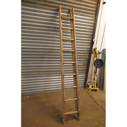 2189 - Two wooden  ladders - A double extending and a 12 rung step ladder