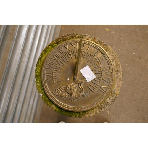 2199 - A stone and brass sun dial