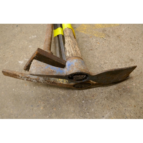 2215 - Two pick axes, two large crow bars and a ram bar