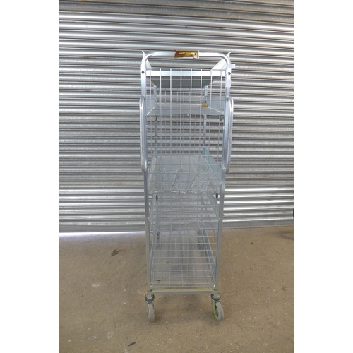 2249 - A stainless steel 4-wheeled 5-tierd catering trolley