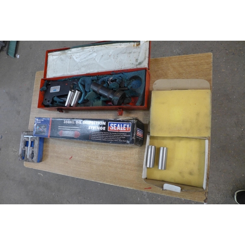 2267 - A job lot of car related tools including a laser plastic oil plug driver set , a Sealey 350ml oil in... 