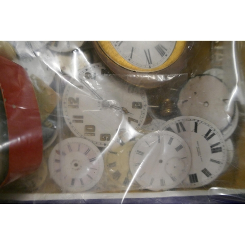 2290 - A box of various household items including plugs, spoons, mini clock faces and a large assortment of... 