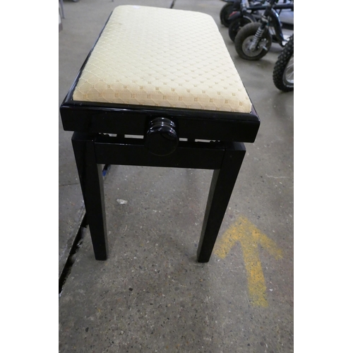 2310 - A black lacquered piano stool with fabric top and Ikea adjustable padded bedroom stool