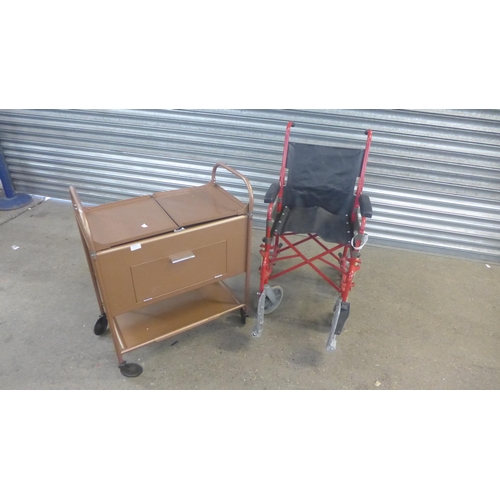 2279 - A metal hostess trolley and a small wheel wheelchair