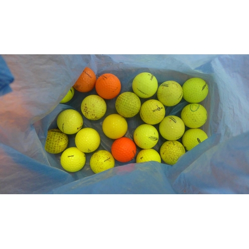 2342 - A box of assorted golf balls and 8 assorted clubs