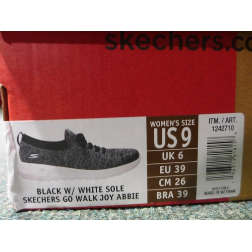3046 - Pair of womens Black Skechers size UK 6. *This lot is subject to VAT