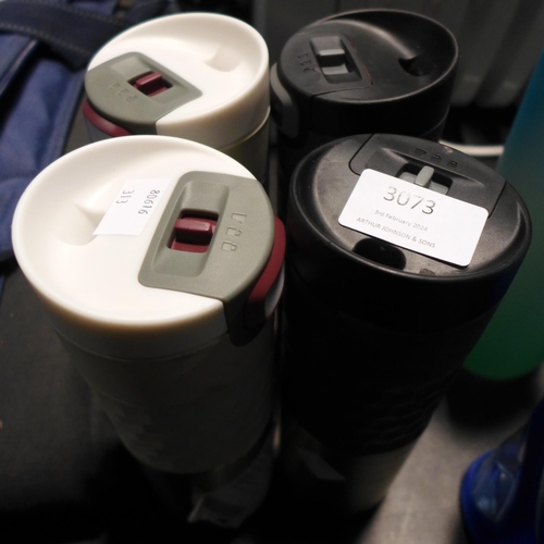 3073 - Four Kambukka Hot/Cold Travel Mugs  (313-209,432,433)   * This lot is subject to vat