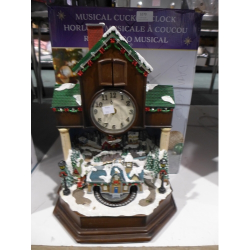 3270 - Festive Cuckoo Clock (313-32,124)   * This lot is subject to vat