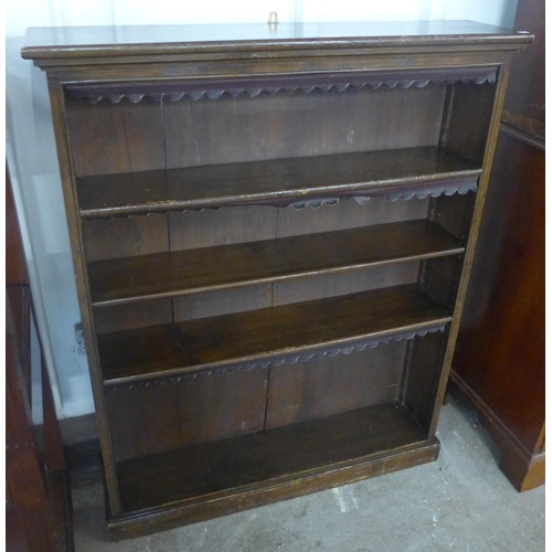 116 - A Victorian Ben Purser & Sons walnut open bookcase