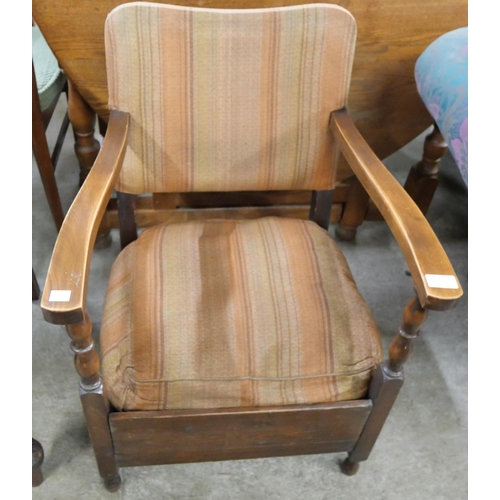 193 - A 1930's beech fireside chair