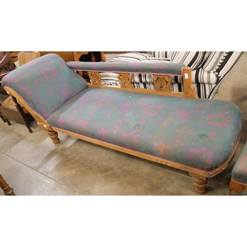 194 - A Victorian oak and fabric  upholstered chaise longue and pair of matching chairs