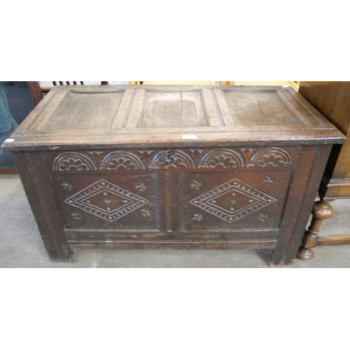 211 - A William III carved oak coffer