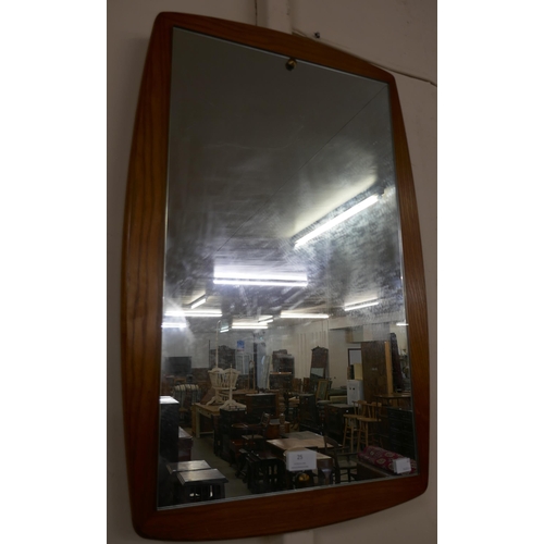 25 - A teak framed mirror