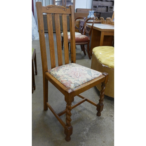 250 - A set of four early 20th Century oak barleytwist dining chairs