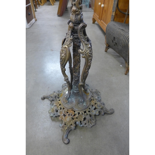 267 - A French Art Nouveau brass and copper floor standing oil lamp