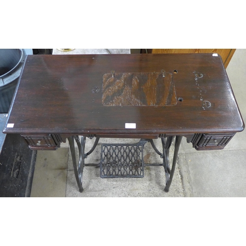 285 - A Bradbury sewing machine table