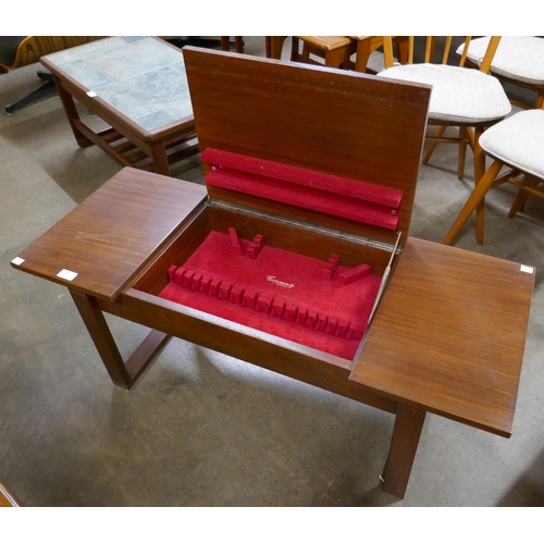 31 - A teak rectangular coffee table