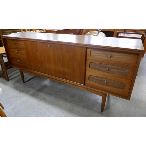 33 - A White & Newton teak sideboard