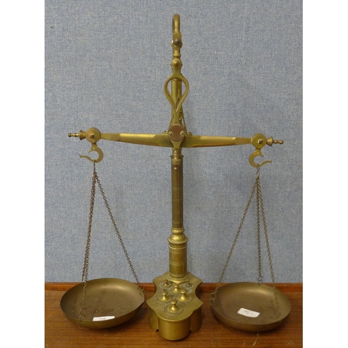 338 - A set of brass balance scales and weights