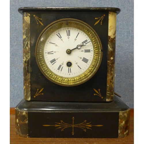 340 - A 19th Century French Belge noir mantel clock