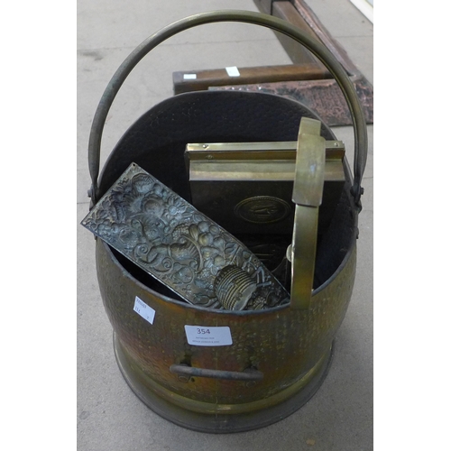 354 - A brass coal scuttle, fire screen, etc.