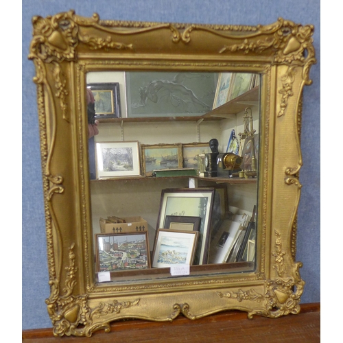 355A - A French style gilt framed mirror