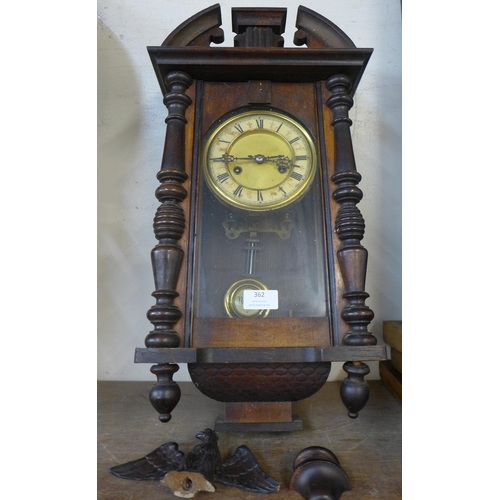 362 - A 19th Century walnut Vienna wall clock