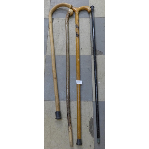 373 - Four wooden walking canes