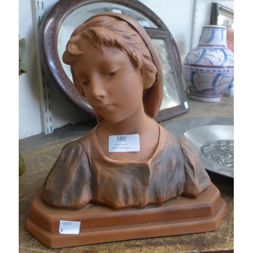 380 - An Art Deco style faux terracotta bust of a lady