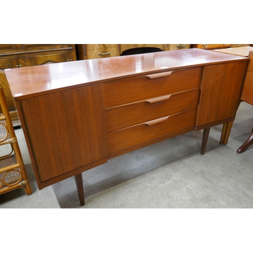 40 - An Austin Suite teak concave sideboard