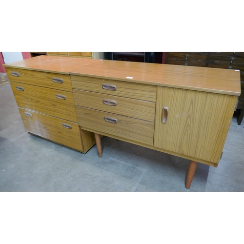 76 - A small teak effect sideboard and matching chest of drawers