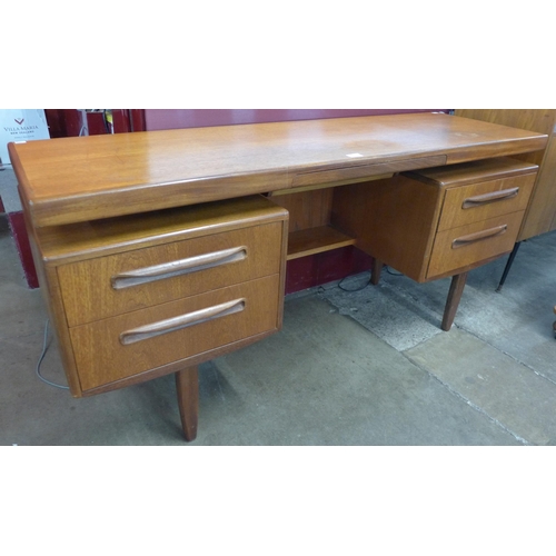 83 - A G-Plan Fresco teak floating top desk