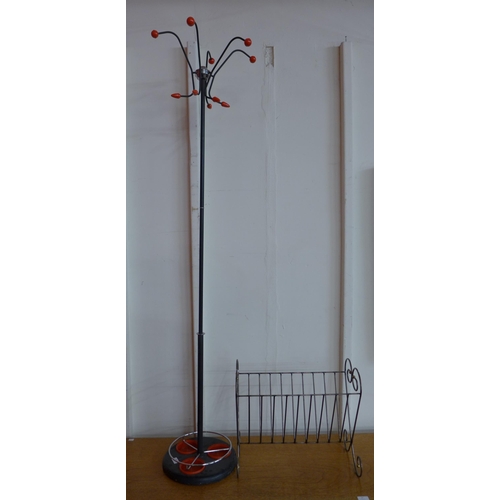 90 - A black metal atomic coatstand and magazine rack