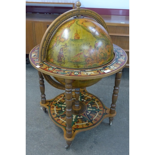 91 - An Italian terrestrial globe cocktail cabinet/trolley