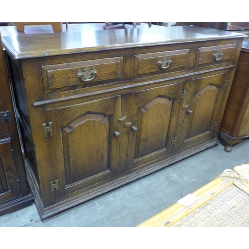 96 - A George III style Ipswich oak dresser