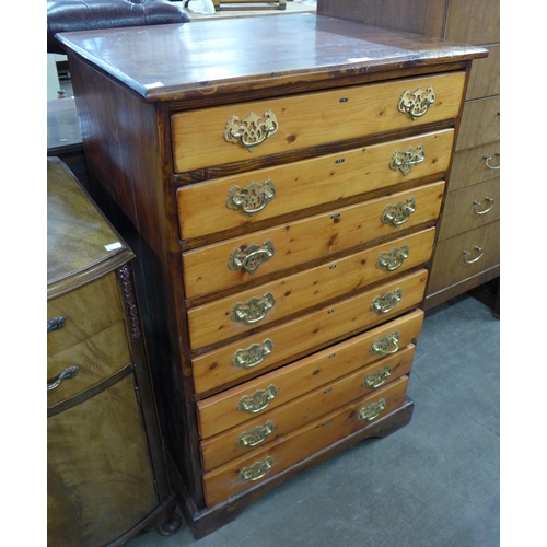 98 - A Victorian style pine collectors chest of drawers