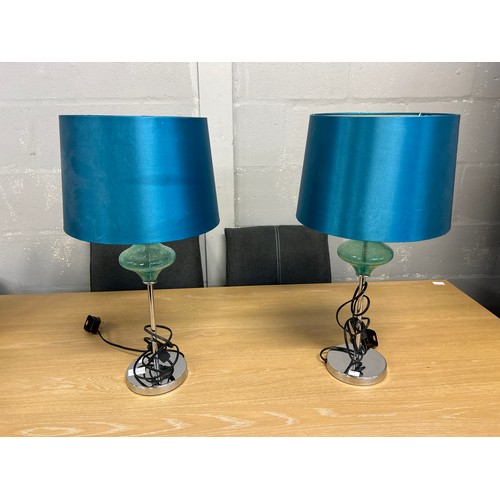 1600A - A pair of teal glass and chrome table lamps